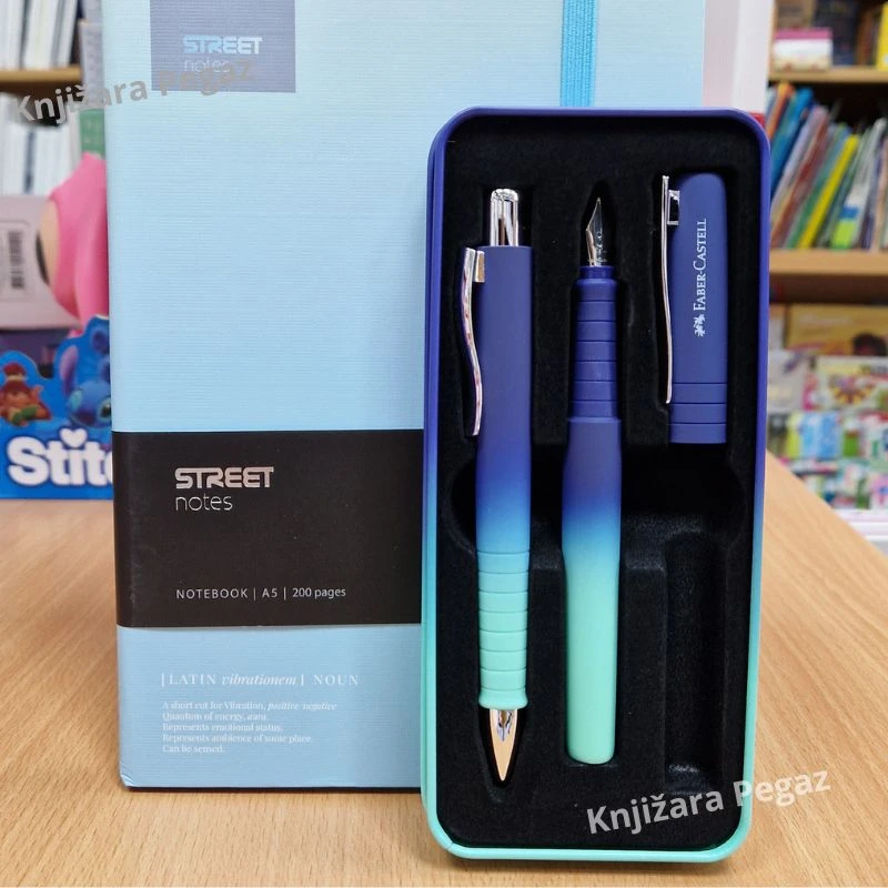 Faber-Castell Poly flow edition buzzing blue set sa hemijskom olovkom i naliv Perom M u metalnoj kutiji, Premium pisaći set 241055